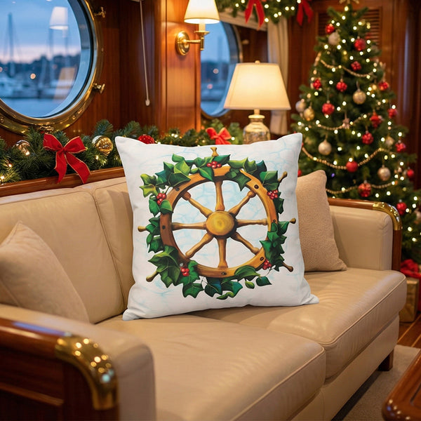 Decorative pillow with a ship's wheel Christmas wreath design on a beige sofa on a boat.