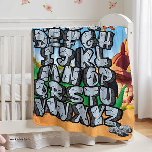 soft sherpa blanket with 'ABC Dinosaur | Newborn & Toddler' design
