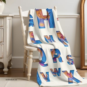 soft sherpa blanket with 'ABC Colorful Cutouts' design