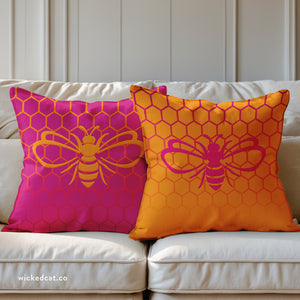 throw pillow with 'Honeycomb Bee Reversible Pink & Orange' design