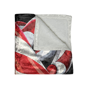 Soft sherpa blanket with 'Candy Cane Twists Holiday Throw' design