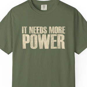 Green t-shirt with graphic design and text on a white background