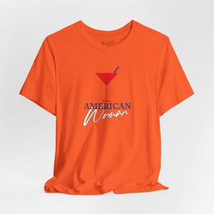 Light blue t-shirt with 'American Woman Patriotic Martini July 4th' design on a white background