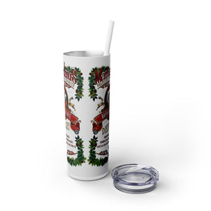 Tumbler with Christmas-themed design on a white background