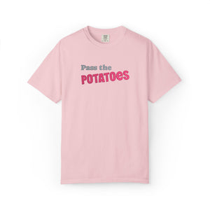 Light Pink t-shirt with embroidered text that says Pass the Potatoes 