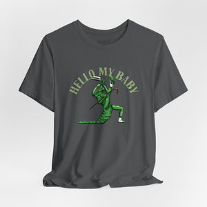 Purple short-sleeve crewneck t-shirt featuring a green alien dancing, with the text 'HELLO MY BABY' arched above it, displayed on a light gray background.