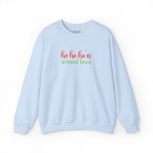 Light Blue sweatshirt that reads ho ho ho'n around town in red and green text.