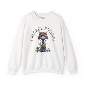 White sweatshirt with a graphic of a cat tangled in Christmas lights and text the says 'I Regret Nothing'.
