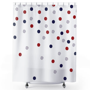 Shower curtain with red, blue, and gray polka dots on a white background