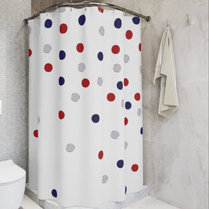 Shower curtain with colorful polka dot pattern in a bathroom setting