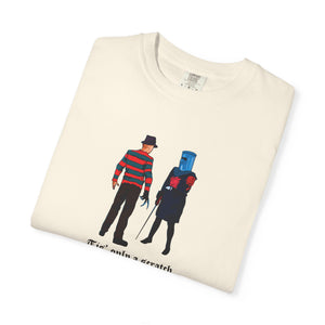 Folded cream t-shirt with graphic design of two characters on a white background