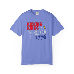 Purple t-shirt  with 'Kicking Kings to the Curb since 1776' text and graphics on a white background.
