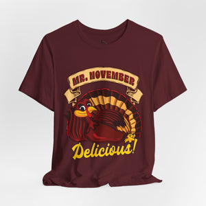 Orange t-shirt with 'Mr. November Turkey Funny Thanksgiving' design on a white background