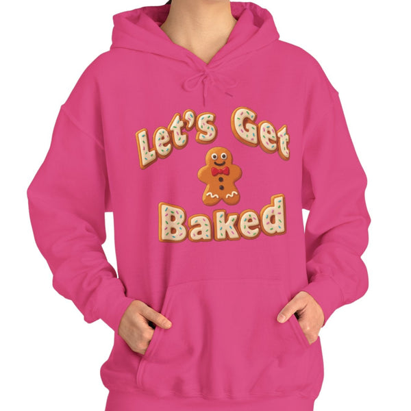 Person wearing a pink hoodie with 'Let's Get Baked' text on a white background