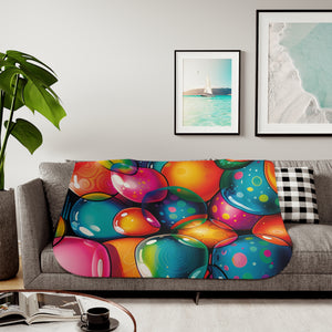 Soft sherpa blanket with 'Bouncy Balls' design