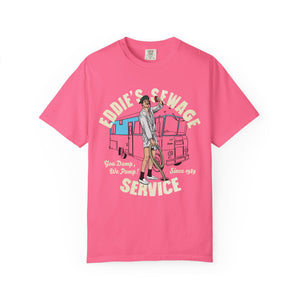 Pink t-shirt with logo graphic and text 'Eddie's Sewage Service You Dump We Pump Since 1989'.