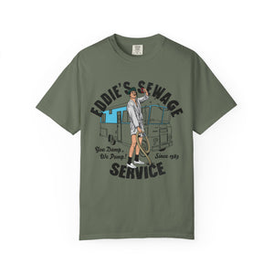 Green t-shirt with logo graphic and text 'Eddie's Sewage Service You Dump We Pump Since 1989'.