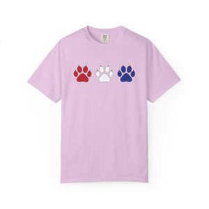 Light purple t-shirt with red, white, and blue paw prints on a white background
