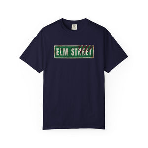 Navy blue t-shirt featuring a distressed green 'ELM STREET' sign graphic printed on the chest.