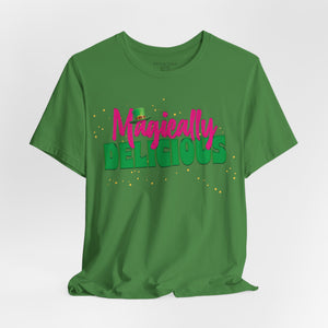 Orange t-shirt with 'Magically Delicious Funny St. Patrick's Day' design on a white background