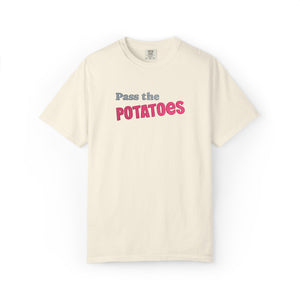 Ivory t-shirt with embroidered text that says Pass the Potatoes 