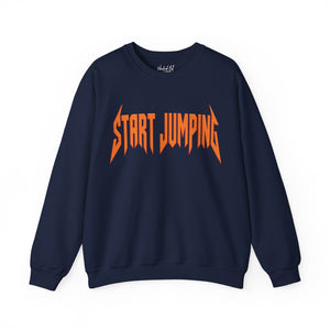 A navy blue crewneck sweatshirt featuring the phrase 'START JUMPING' printed across the chest in a stylized orange font resembling the Metallica logo, shown on a plain white background.