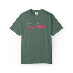 Green t-shirt with embroidered text that says Pass the Potatoes 