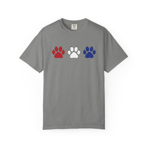 Gray t-shirt with red, white, and blue paw prints on a white background