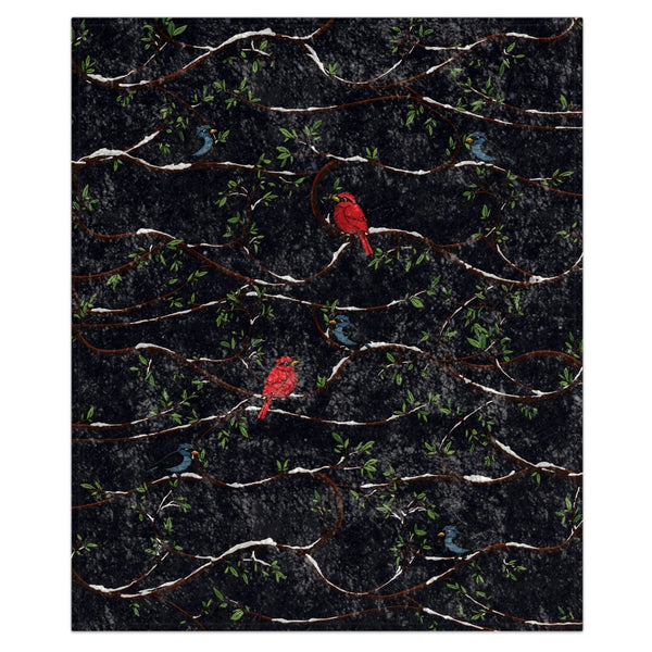 Patterned fabric with red and black birds and branches with snow on a dark blue background