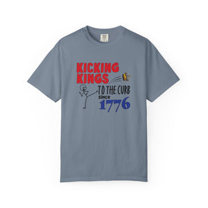 Gray t-shirt  with 'Kicking Kings to the Curb since 1776' text and graphics on a white background.
