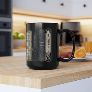 Black coffee mug with Halloween books design on a kitchen counter.