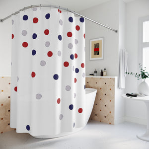 Shower curtain with colorful polka dots in a bathroom setting