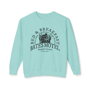 White sweatshirt with 'Bates Motel Halloween Fall' design on a plain background