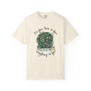 ivory t-shirt with a graphic of a tangled ball of lights with text It's fine, this is fine, everything is fine.