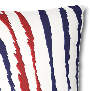 A square-shaped throw pillow cover with a red, white, and blue animal print design.