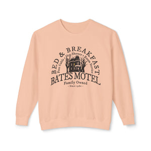 Grey sweatshirt with 'Bates Motel Halloween Fall' design on a plain background