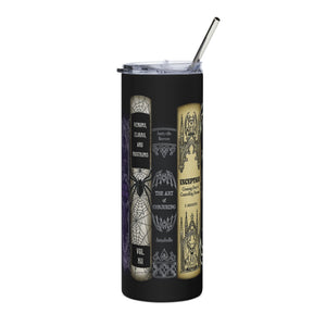 A tall black insulated tumbler with a clear lid and metal straw, printed with gothic book-cover artwork including spiderweb spines and parchment pages. 