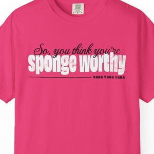 Person wearing a white t-shirt with 'Sponge Worthy 90s Seinfeld Grunge' design on a plain background