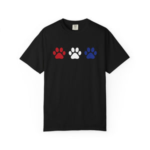 Black t-shirt with red, white, and blue paw prints on a white background