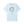 A light blue short-sleeve crewneck t-shirt featuring a graphic of a fried egg inside a frying pan with the text 'THIS IS NOT AN EGG' arched above it, displayed on a clean white background.