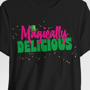 Person wearing a black t-shirt with 'Magically Delicious Funny St. Patrick's Day' design on a plain background