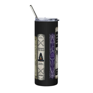 A tall black insulated tumbler with a clear lid and metal straw, featuring gothic-style book spines.