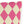 Pink and beige checkered pillow on a white background