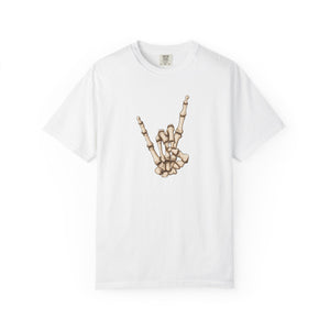 A white  t-shirt with skeleton hand making 'rock on' gesture on a white background