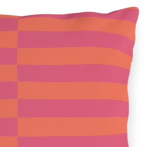 A square-shaped outdoor throw pillow with a striped pattern in pink and orange colors.