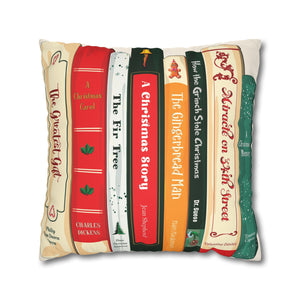 Decorative holiday pillow with book spine designs on a white background