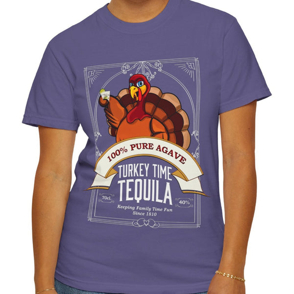 Person wearing a purple t-shirt with a turkey graphic and text on a white background