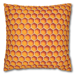 A square-shaped accent pillow with a honeycomb pattern in orange and yellow colors.