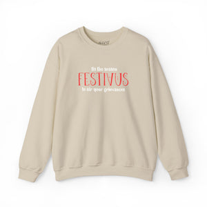 Tan sweatshirt that reads Festivus tis the season to air your grievances.