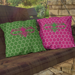 throw pillow with 'Honeycomb Bee Reversible Pink & Green' design